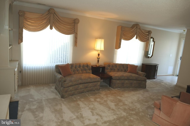 carpeted living area with baseboards and ornamental molding