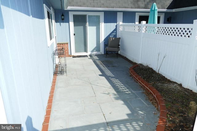 view of patio / terrace with fence