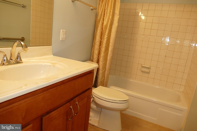 bathroom featuring tile patterned floors, vanity, toilet, and shower / tub combo