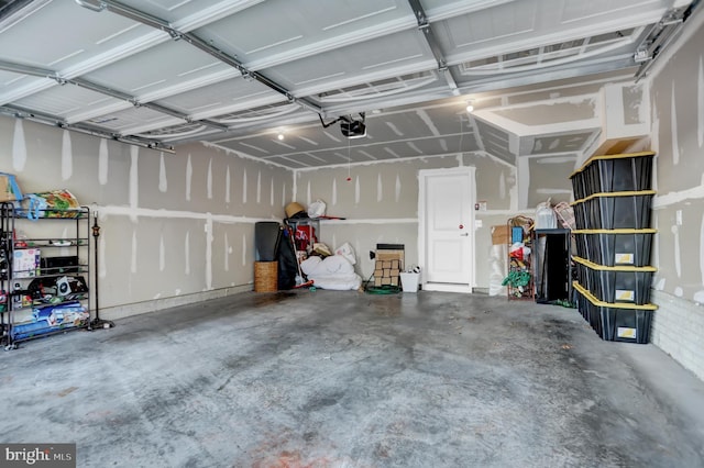 garage featuring a garage door opener