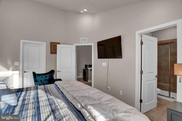 bedroom with a towering ceiling, visible vents, and recessed lighting