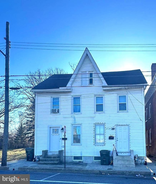 view of front facade with cooling unit