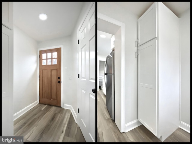 foyer entrance featuring hardwood / wood-style floors