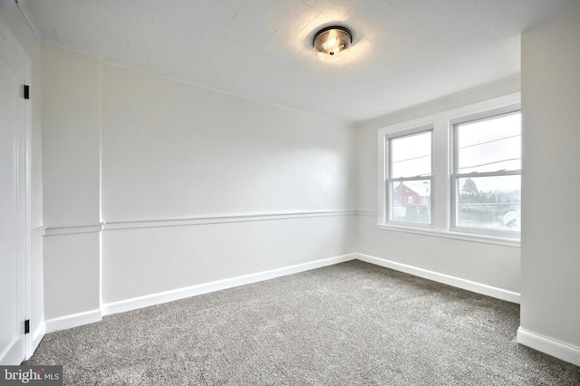 empty room with carpet flooring