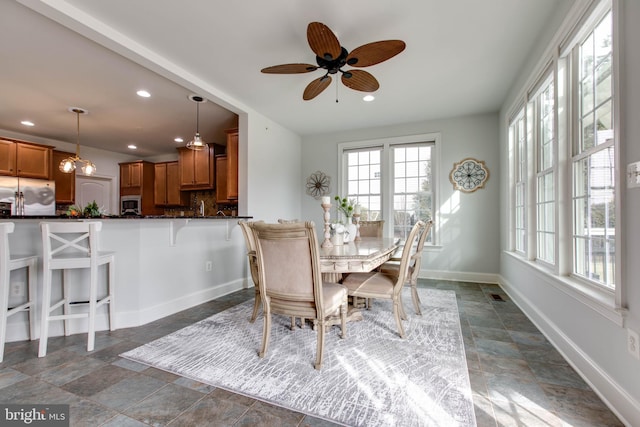 dining room with ceiling fan