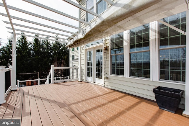 wooden terrace with a pergola