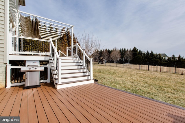 wooden deck with a yard