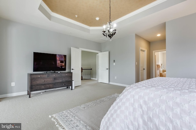 bedroom featuring carpet flooring, a notable chandelier, and a raised ceiling