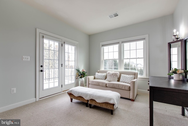 living room with light carpet