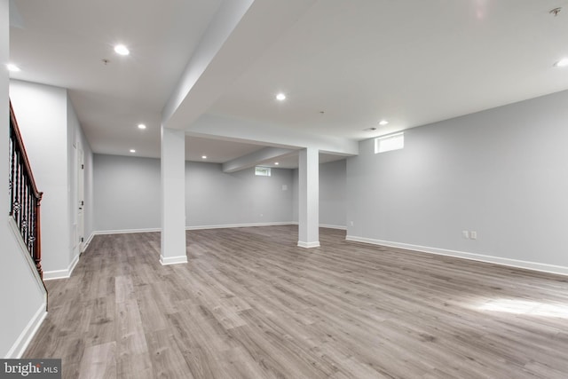 basement with light wood-type flooring