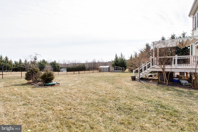 view of yard with a wooden deck