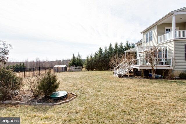 view of yard with a wooden deck