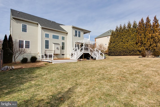 rear view of property with a lawn, a pergola, and a wooden deck