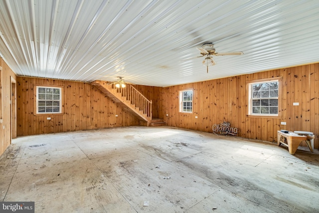 interior space featuring stairway, plenty of natural light, and ceiling fan