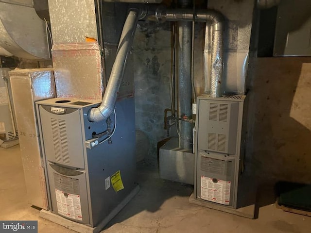 utility room with heating unit