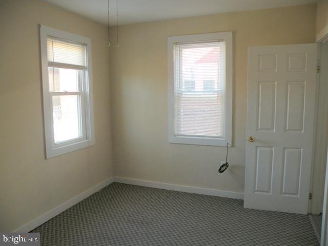 empty room with carpet floors