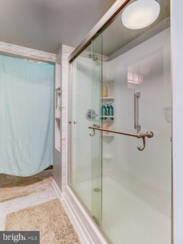 full bath featuring a stall shower