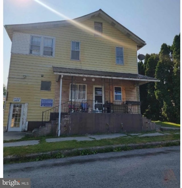 view of front of house with covered porch