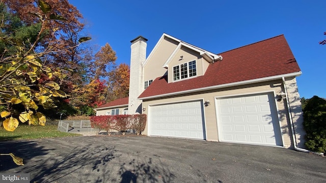 view of home's exterior featuring a garage