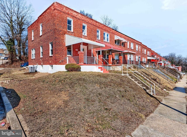 view of building exterior featuring cooling unit