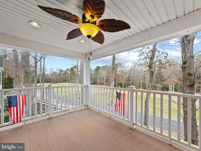 wooden terrace with ceiling fan