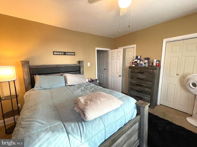 carpeted bedroom featuring ceiling fan