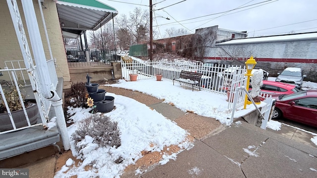 view of yard covered in snow