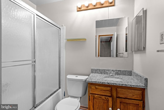 9112 Old Burton Cir, Upper Marlboro, MD 20772 - bathroom featuring vanity, toilet, and shower / bath combination with glass door
