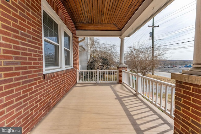 wooden deck featuring a porch