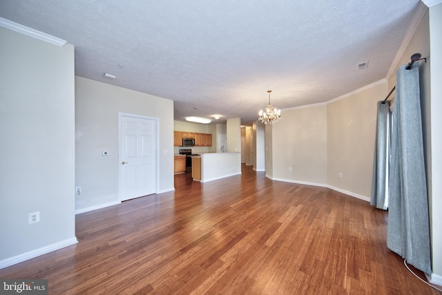 unfurnished living room with a chandelier, dark wood-type flooring, and baseboards