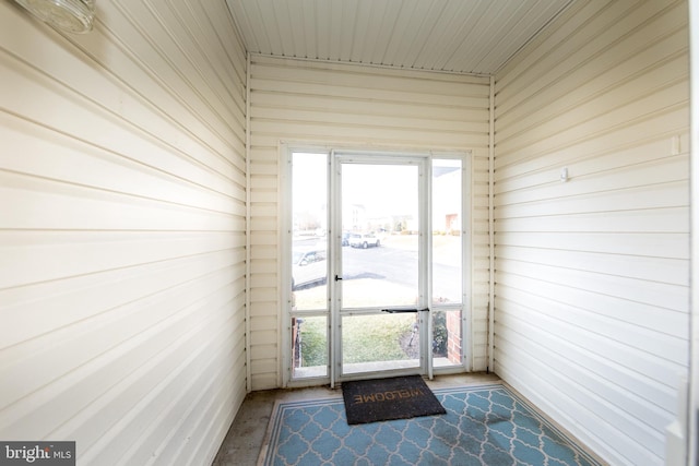 doorway to outside with a sunroom