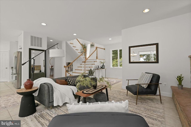 tiled living room featuring recessed lighting, visible vents, stairway, and baseboards