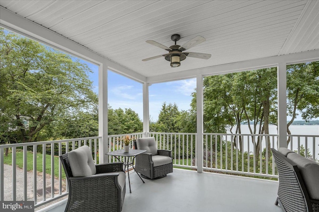 sunroom / solarium with ceiling fan