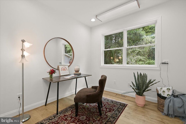 office area with recessed lighting, baseboards, visible vents, and light wood finished floors