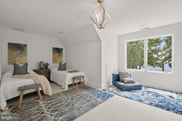 bedroom featuring lofted ceiling, visible vents, a chandelier, and baseboards