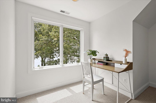 home office featuring baseboards and visible vents