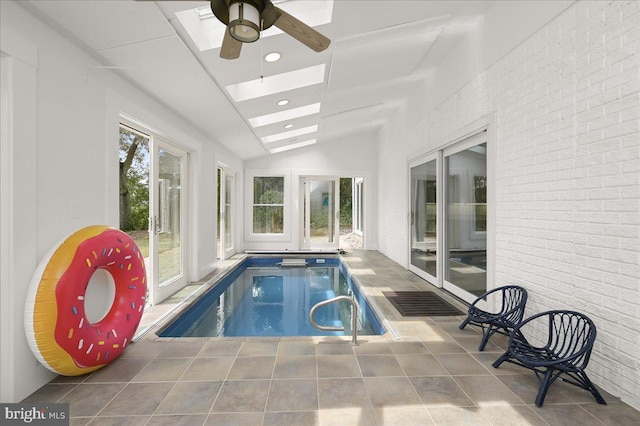 pool featuring a skylight