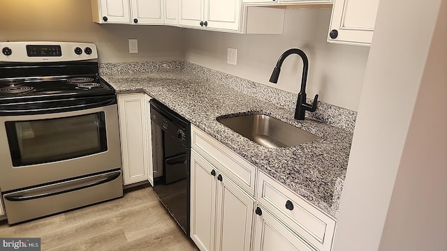 kitchen with dishwasher, stainless steel electric range oven, white cabinetry, and a sink