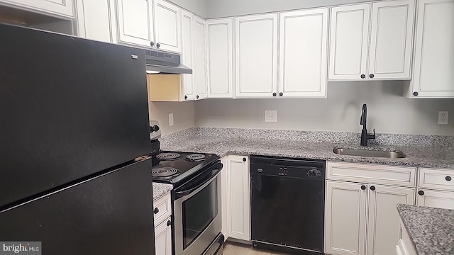 kitchen featuring black appliances, under cabinet range hood, white cabinetry, and a sink