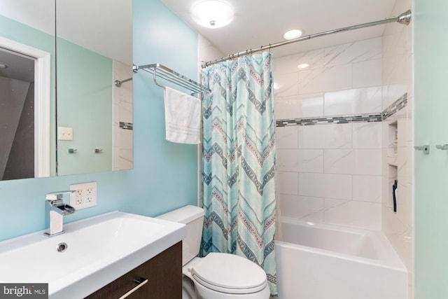 full bathroom with toilet, vanity, and shower / bath combo with shower curtain