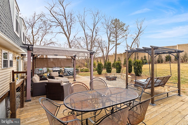 wooden deck with a pergola and an outdoor living space with a fire pit