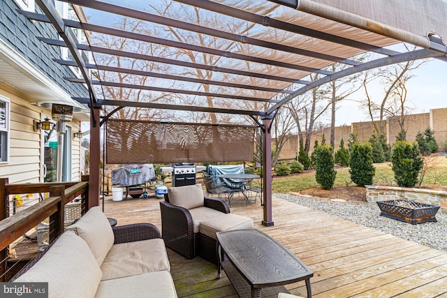 deck with a pergola and an outdoor living space with a fire pit