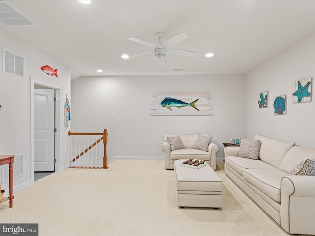 living room with a ceiling fan, recessed lighting, visible vents, and baseboards