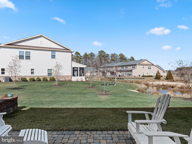 view of yard featuring central AC unit