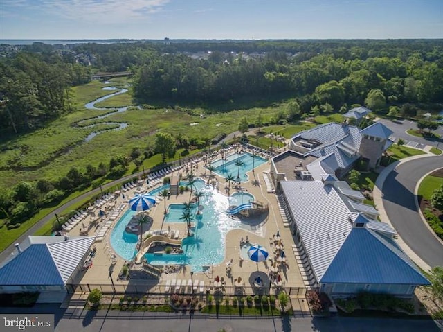 aerial view featuring a view of trees