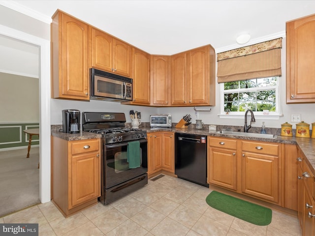 330 Mountaineers Way, Emmitsburg, MD 21727 - kitchen featuring black appliances, a sink, ornamental molding, brown cabinets, and dark stone counters