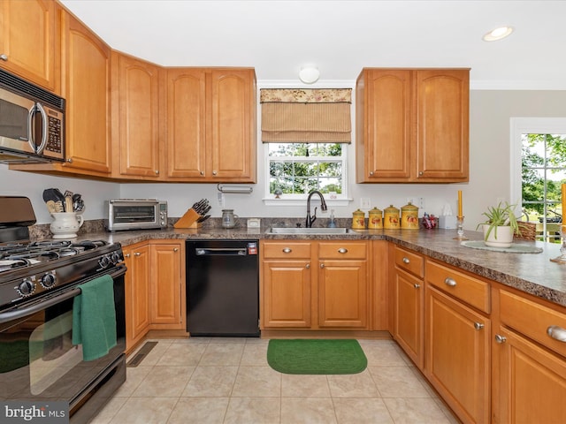 330 Mountaineers Way, Emmitsburg, MD 21727 - kitchen featuring black appliances, a sink, plenty of natural light, light tile patterned floors, and crown molding