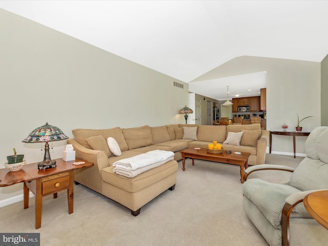 330 Mountaineers Way, Emmitsburg, MD 21727 - living area featuring vaulted ceiling, light carpet, and baseboards