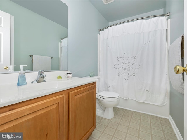 330 Mountaineers Way, Emmitsburg, MD 21727 - bathroom featuring vanity, tile patterned floors, toilet, and shower / bath combo with shower curtain