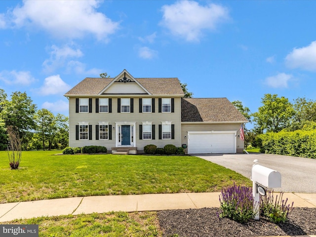 330 Mountaineers Way, Emmitsburg, MD 21727 - colonial home featuring a garage, driveway, and a front yard